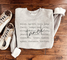 Load image into Gallery viewer, Track Word Graphic Sweatshirt - Southern Grace Shoppe